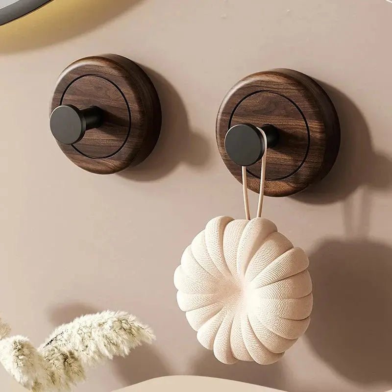 The Hang walnut suction-cup hook on a suitable smooth surface