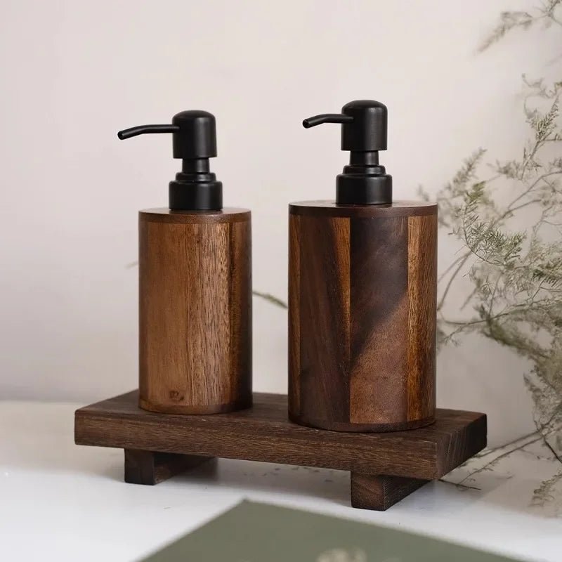 The Pour walnut wood pump dispenser by Oak & Origin.